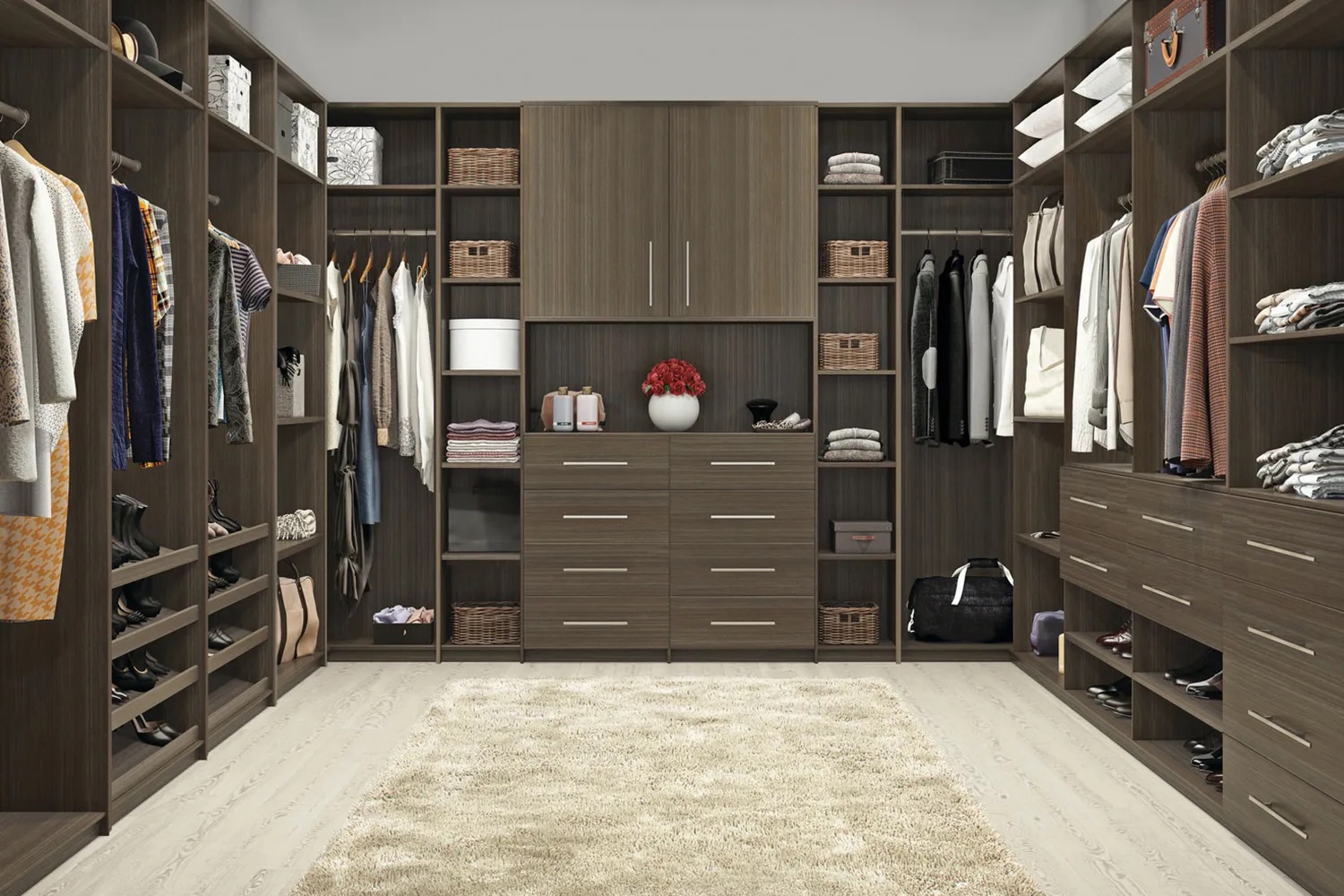 Walk-in closet in walnut woodgrain with a full storage system